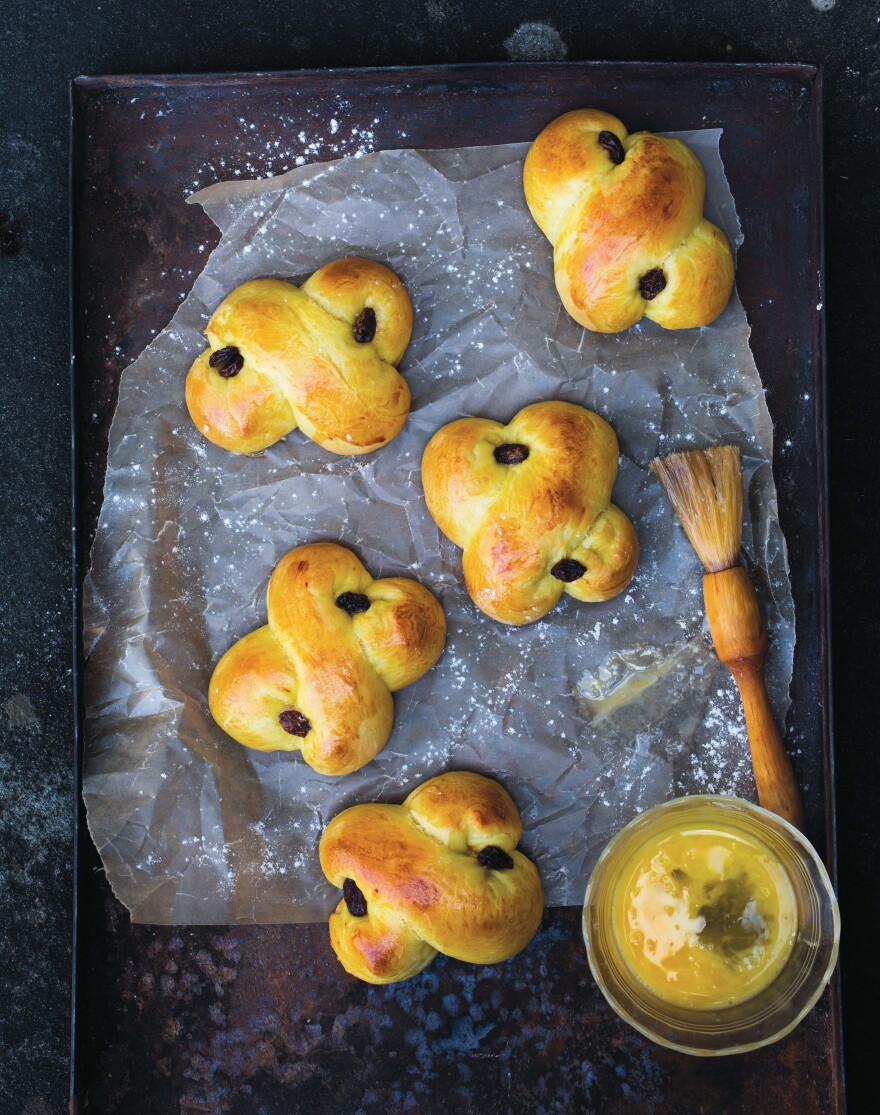 In December, saffron buns are baked into many different symbolic shapes that have roots in both Christian and pagan practices.