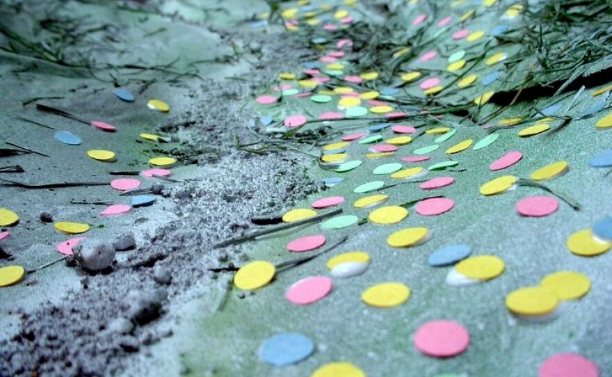 Close-up of the small pink, yellow, and green dots added to represent those who died during the Massacre. 