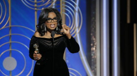 This image released by NBC shows Oprah Winfrey accepting the Cecil B. DeMille Award at the 75th Annual Golden Globe Awards in Beverly Hills, Calif., on Sunday, Jan. 7, 2018. (Paul Drinkwater/NBC via AP)