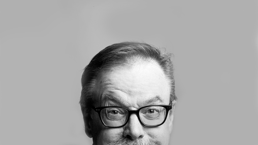 Black and white close-up photo of radio host Colin McEnroe.