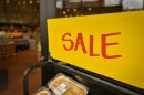 A sale sign marks discounted grocery items in Salt Lake City, July 28, 2026. Economists say rising prices for essentials have contributed to ongoing concerns about affordability, even as Utah's economy continues to outperform many states.