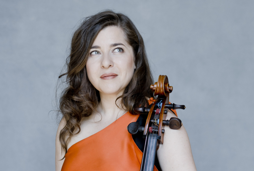 Portrait of cellist Alisa Weilerstein with her cello.