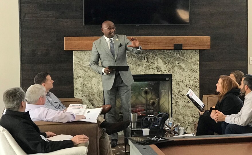 Dr. Karockas Watkins of the Huntsville/Madison Chamber of Commerce talks with the local board and staff of BancorpSouth in Hunstville, Alabama in 2020.