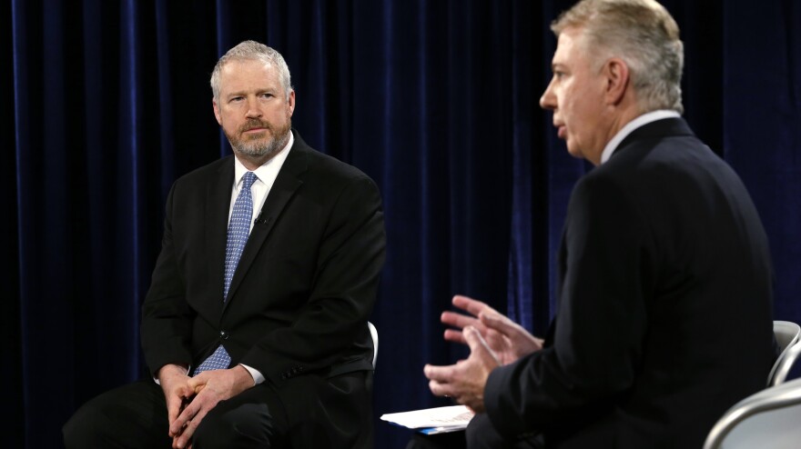 Seattle Mayor Mike McGinn (left) listens as state Sen. Ed Murray answers a question during a debate in their race for mayor on Oct. 9.