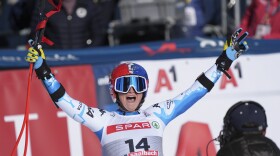 United States' Lauren Macuga celebrates at the finish area of a women's Super-G, at the Alpine Ski World Championships, in Saalbach-Hinterglemm, Austria, Thursday, Feb. 6, 2025.
