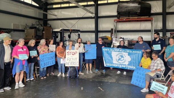 Residents of manufactured homes in Johnson County at a press conference organized by Johnson County Residents United on June 18.
