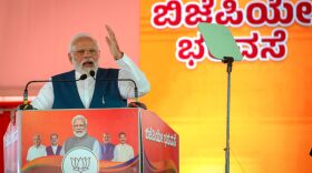 India's Prime Minister Narendra Modi addresses a gathering of supporters during a political event organised by the Bharatiya Janata Party (BJP) at the GMIT College Grounds in Davangere, India.