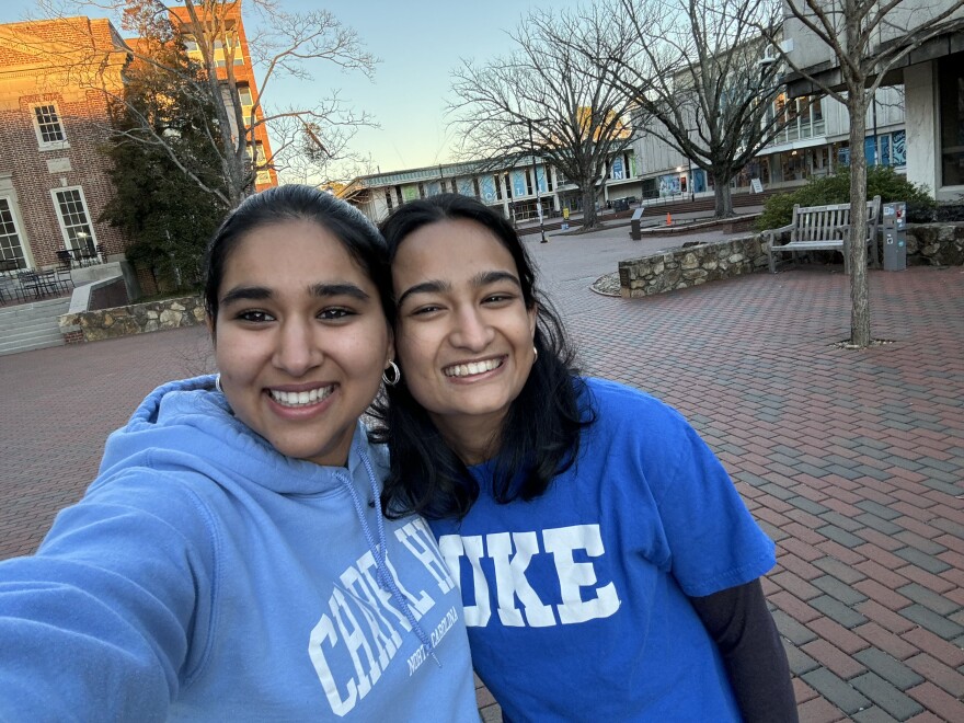 Shristi Sharma, on left, with Fedora Castelino attending a UNC versus Duke game day at the UNC-Chapel Hill campus.