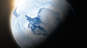 Sun over Antarctica on blue planet Earth isolated on black background. Highly detailed planet surface. Elements of this image furnished by NASA.