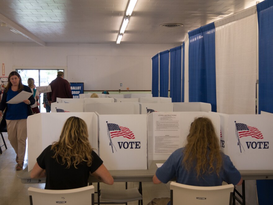 Voters cast ballots at the Missoula County Fairgrounds, May 25, 2017.