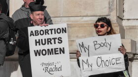 Opposing signs regarding abortion