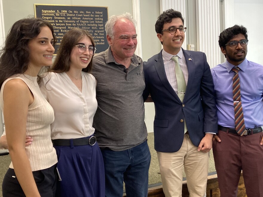 Senator Tim Kaine poses with students who came to hear him speak in Charlottesville.