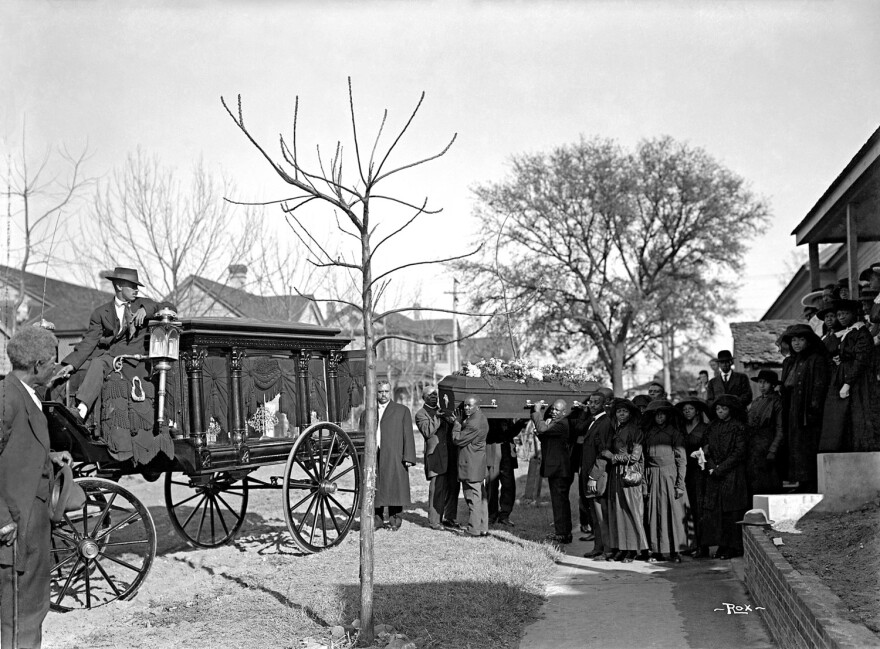 A funeral procession circa 1910.