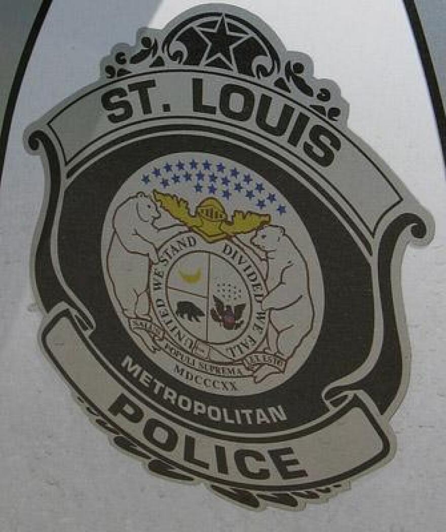 The logo of the St. Louis Metropolitan Police displayed on a patrol vehicle.