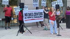 Protesters gather in front of the Charlotte-Mecklenburg Government Center.