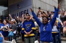 Fans cheer loudly as the Blues pass during the championship parade on Saturday, June 15, 2019.