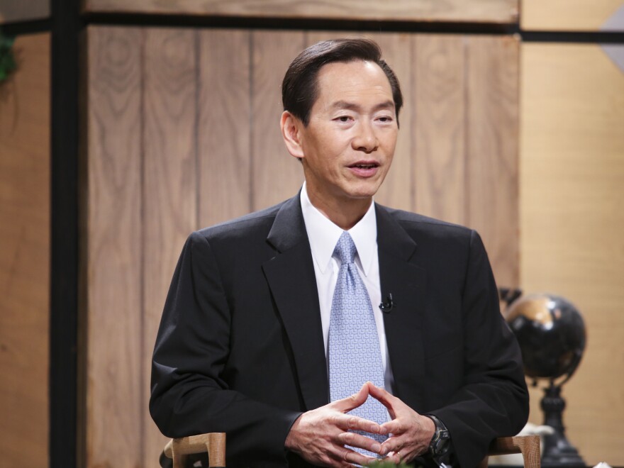 Executive Council convener Bernard Chan, pictured on an RTHK program in 2017, says he has urged the territory's government to reevaluate the situation.