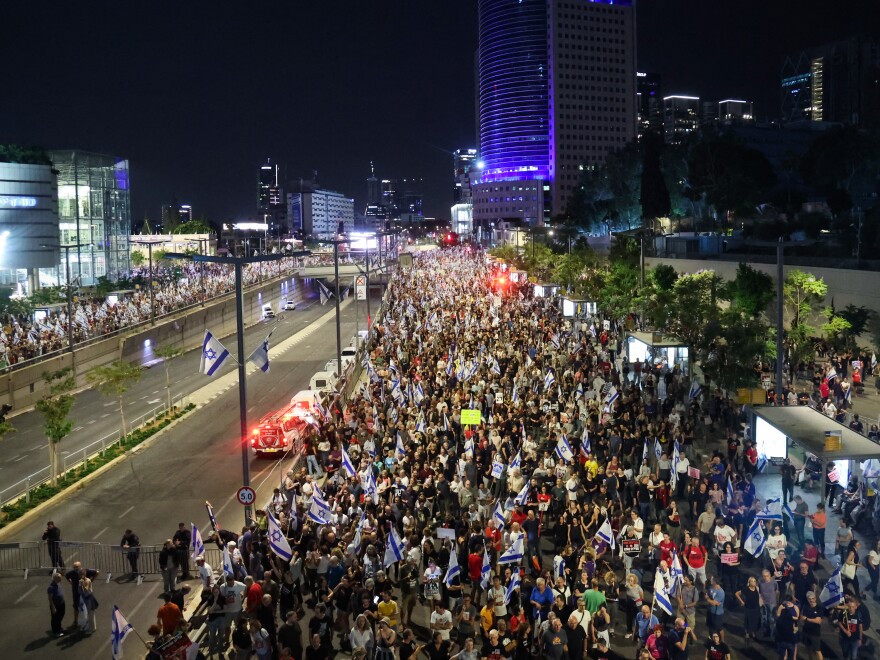 Relatives and supporters of Israelis taken hostage by Palestinian militants in Gaza hold a demonstration calling for their release, in Tel Aviv on Saturday.