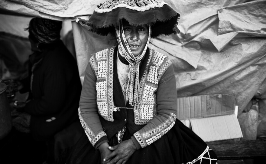 Portrait of a Quechua woman in traditional dress in the Andean town of Ocongate