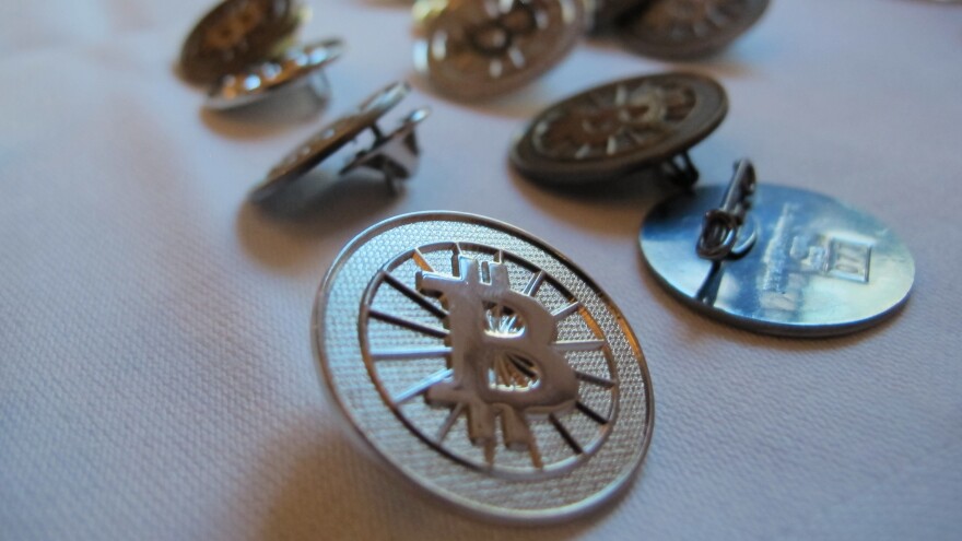 No, these aren't real bitcoins (just Bitcoin buttons). Fans of the virtual currency see several real benefits, including the elimination of fees for transferring money.