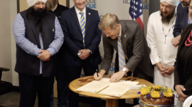 Albuquerque Mayor Tim Keller signs documents to begin sister city partnership with Kharkiv