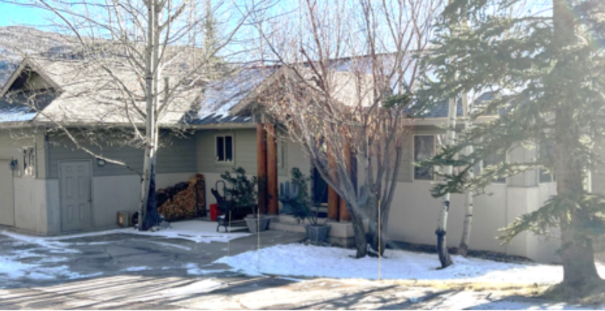 The house at 83 Maverick Circle has four bedrooms, a fireplace, and a yard. It’s located up the hill behind the Snowmass Village Recreation Center.