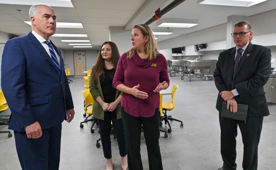 U.S. Senator Bob Casey hears about the cadaver lab at the college's Frank and Carolyn Kowalski Center for Advanced Healthcare Education.