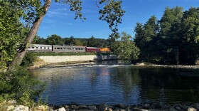 The new 242-foot-long retaining wall along the Cuyahoga River in Peninsula near lock 29 with the Cuyahoga Valley Scenic Railroad.