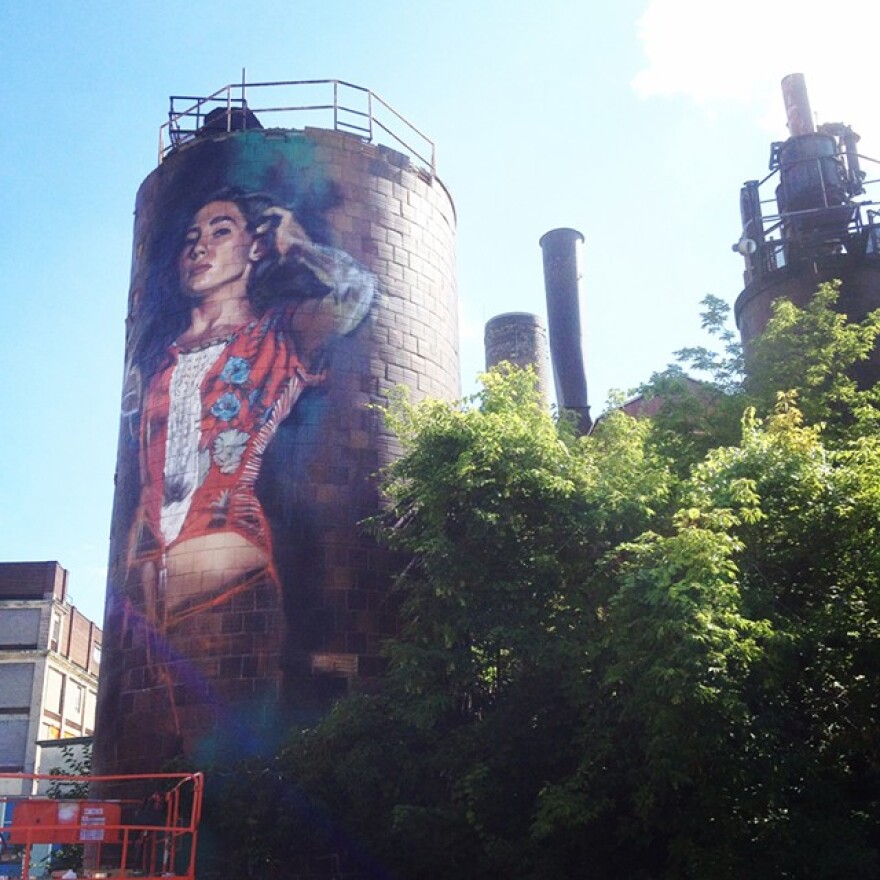 Canadian artist Jarus painted "Avery" on a tower at the Fedder Complex for Wall\Therapy in 2014.