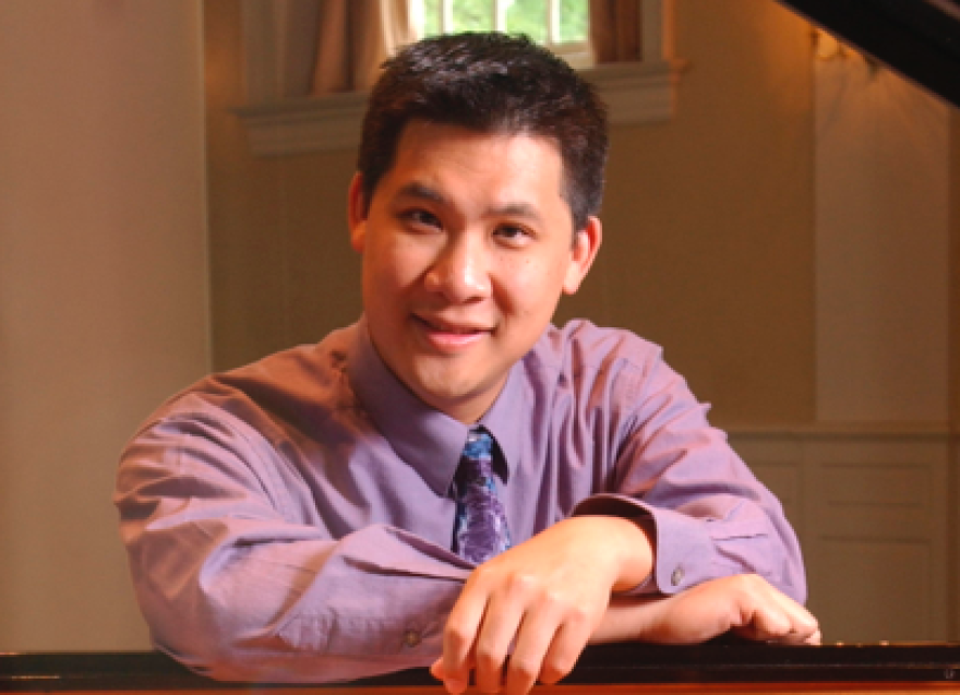 Ching-chu Hu wearing a lavender dress shirt