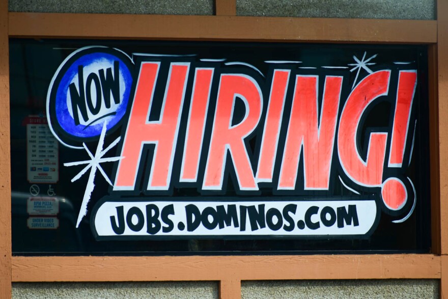 A hiring sign on a Domino's pizza location in South Bend. 