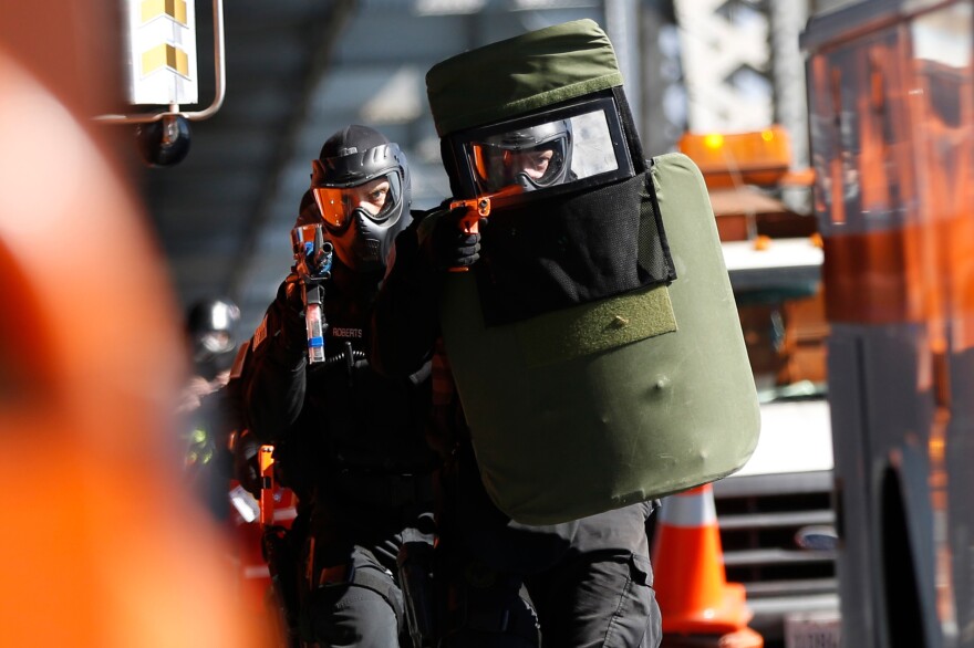 Members of the San Leandro Police Department SWAT Team during a planned training exercise in 2013. The FBI has been monitoring "swatting" — made-up crimes called in to 911 that are designed to get SWAT teams to deploy — for nearly 10 years.