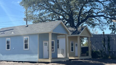 Trinity Village’s small cottages line the edge of Garden Street in Pensacola. The project aims to give vulnerable seniors a safe place to call home.