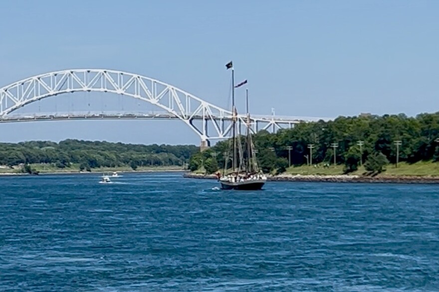 The 130-foot tall ship Angelique makes its way through the Cape Cod Canal on its way to Sail250 in Boston, July 9, 2026.