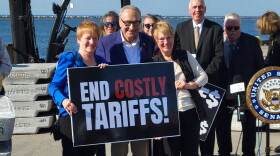 Sen. Chuck Schumer (D-NY) poses with participants at a press conference Oct. 29, 2026 at the Port of Oswego Authority focused on the damage done by President Trump's tariffs.