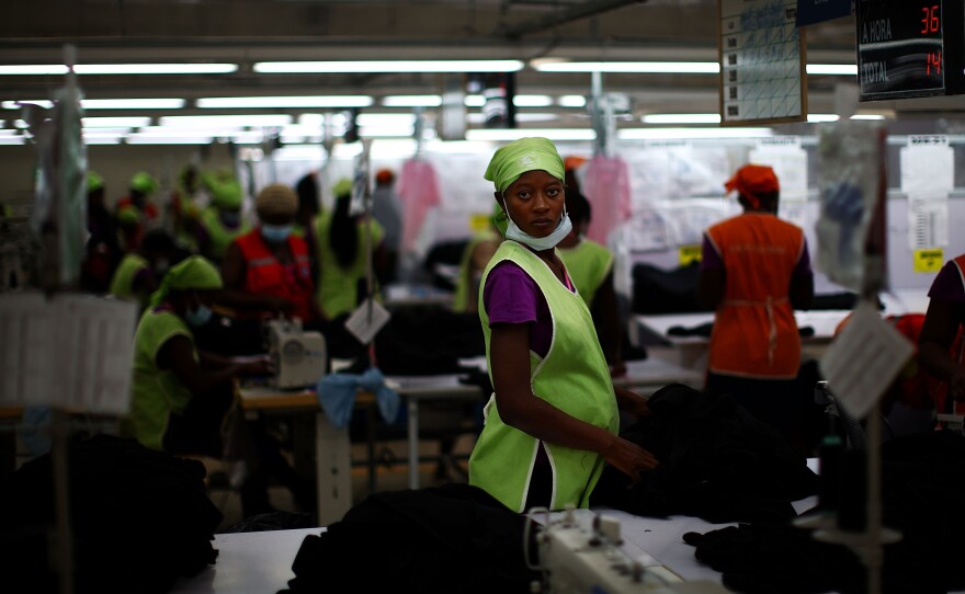 Backers of the industrial park project say it could create 60,000 jobs inside the park. Here, workers at the SAE-A textile plant.
