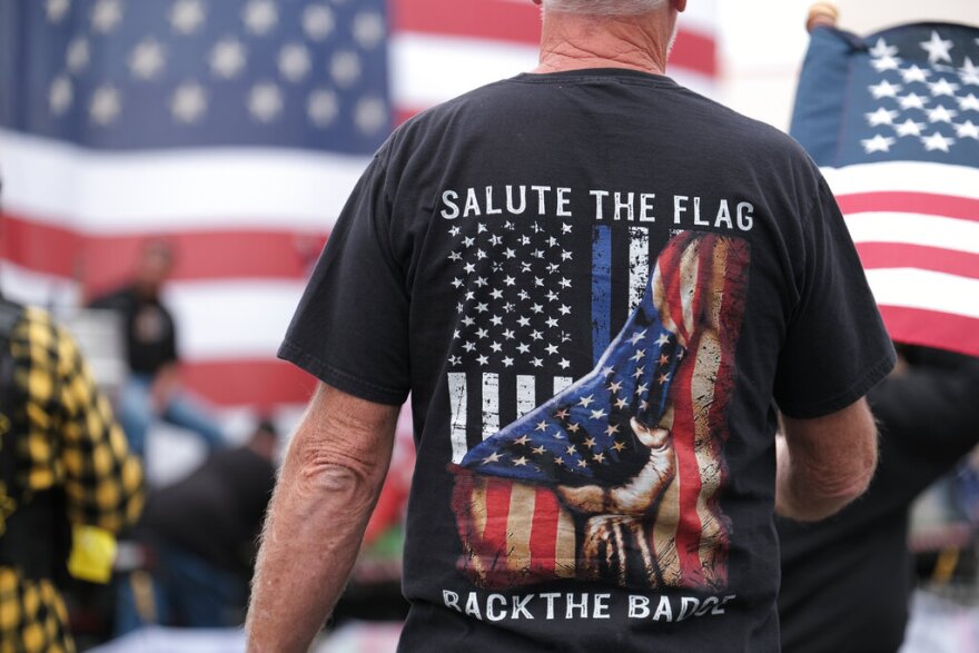 Members of the far-right group Proud Boys gather for a rally in an abandoned parking lot on the outskirts of Portland, Ore. , Sunday, Aug. 22, 2021. (AP Photo/Alex Milan Tracy)