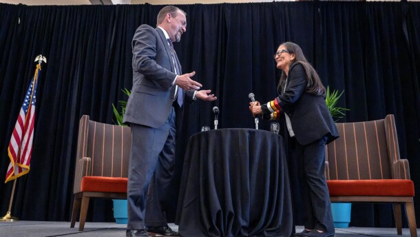 New Mexico gubernatorial candidates Gregg Hull, left, and Deb Haaland, right, share a light-hearted moment after a Tuesday candidate forum at the Albuquerque Convention Center. The event was hosted by the New Mexico chapter of the Commercial Real Estate Development Association, or CREDA.