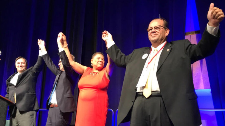 A state party convention staple that will be missing this year: in 2018, Indiana Democrats' statewide candidates joined hands on stage as the convention wrapped up.