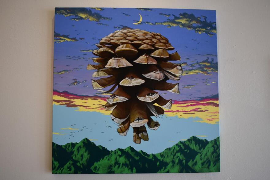 Pine cone and sunset in painting
