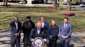 U.S. Senator Chuck Schumer speaking in front of the I-81 viaduct