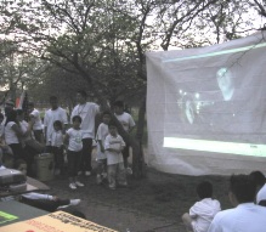 Participants at the rally watched videos about the effects of immigration raids and detentions on communities around the country.