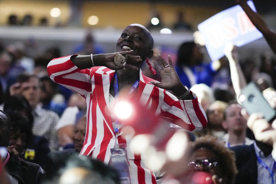 North Carolina delegate and Winston-Salem Mayor Pro Tem D.D. Adams dances during the Democratic National Convention Monday, Aug. 19, 2024, in Chicago. BRYNN ANDERSON/AP