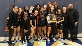 The Peoria High School girls basketball team celebrates its IHSA Class 3A Pontiac Supersectional victory over Marian Catholic on Monday night. The third-ranked Lions advanced to play No. 1 Nazareth Academy in Friday's 10 a.m. semifinal at CEFCU Arena in Normal.