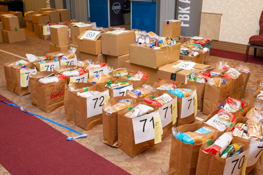 Kris Horlacher, Executive Director of Shoes 4 the Shoeless, says that providing families with three weeks of food at a time will help "flatten the curve" by providing food security and allowing people in need to venture out to stores less often.