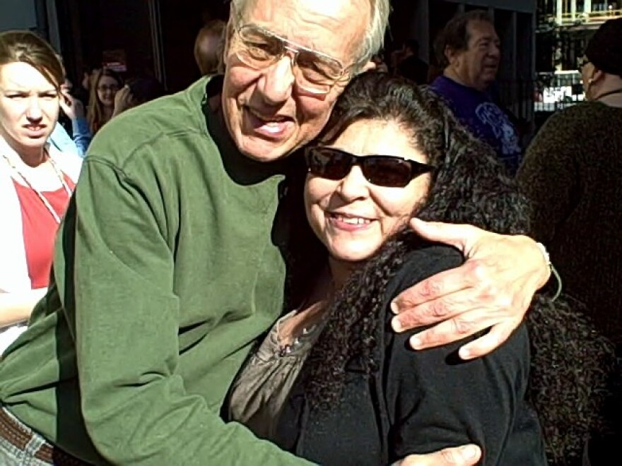 KUT's John Aielli and Ida Maldonado, safe and sound, wait for the all clear from fire officials on UT Campus.