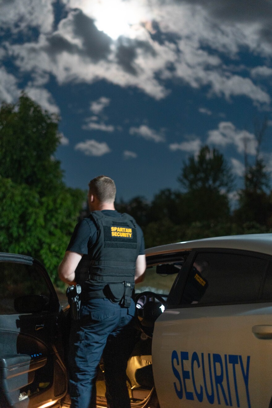 Spartan Security Group employee James Cobb patrols a property in Grants Pass on Aug. 17, 2024.