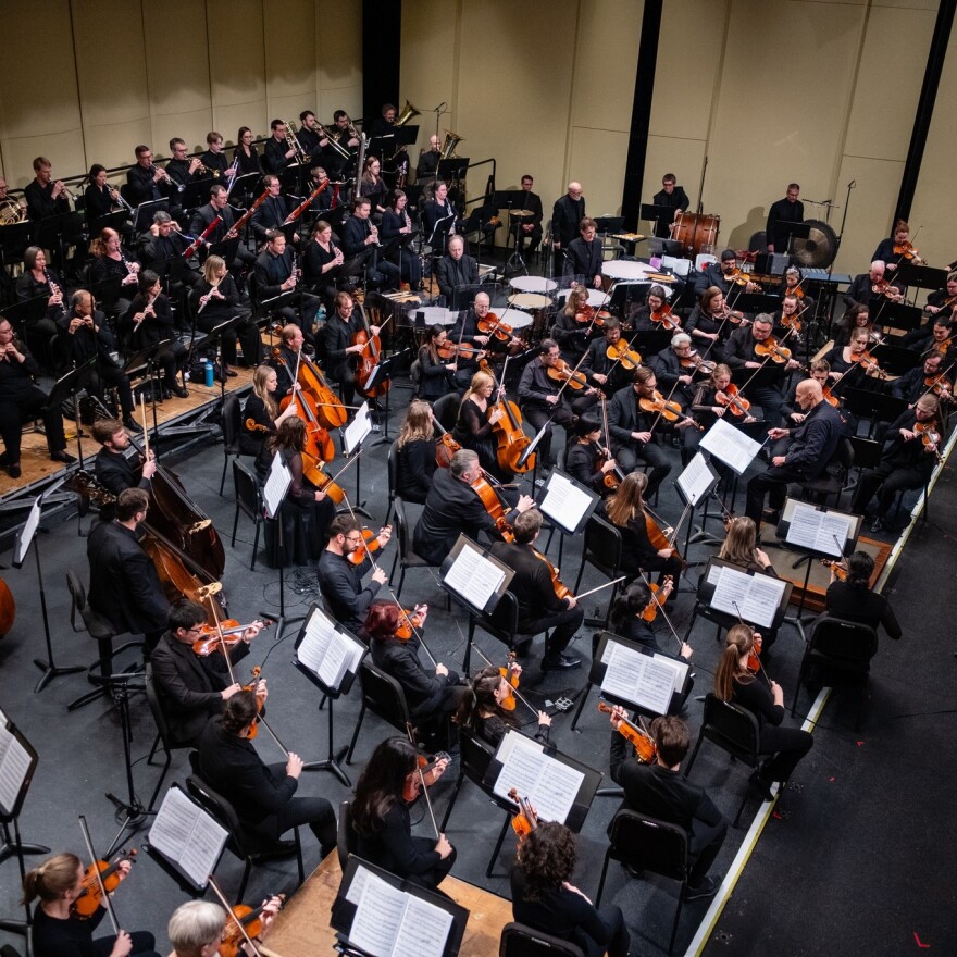 The Quad City Symphony Orchestra (under conductor and music director Mark Russell Smith) usually performs at Davenport's Adler Theatre and Rock Island's Centennial Hall.
