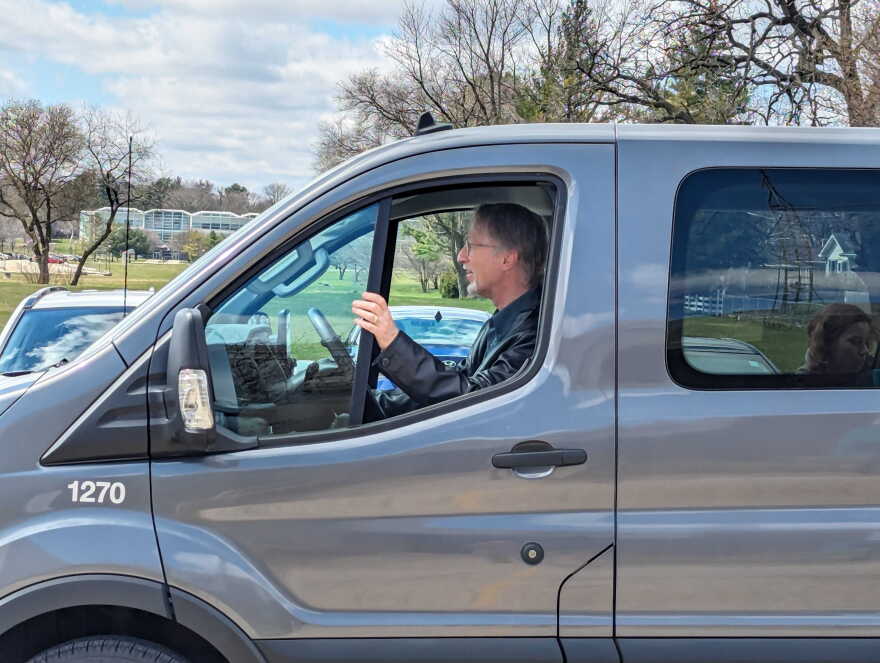 Jason Akst relishing his role as driver for his students' field trip to WNIJ.
