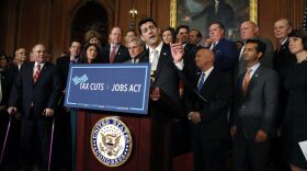 House Speaker Paul Ryan of Wis., joined by House Republicans, speaks to the media following a vote on tax reform, Thursday, Nov. 16, 2017, on Capitol Hill in Washington. Among the members present are, House Majority Whip Steve Scalise, R-La., House Majority Leader Kevin McCarthy of Calif., House Ways and Means Chair Rep. Kevin Brady, R-Texas, and Rep. Cathy McMorris Rodgers, R-Washington. (AP Photo/Jacquelyn Martin)